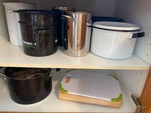 lot 146 image: Assorted Kitchenware with Pots, Pans, and Cutting Board