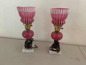 lot 150 image: Two Vintage Fenton Cranberry Spiral Optic Opalescent Lamps with Marble Bases
