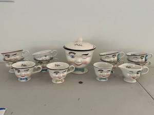 lot 197 image: Baileys Limited Edition Winking Face Creamer, Sugar Bowl, and 10 Cups Set