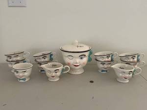lot 198 image: 1996 Limited Edition Paul Cardew Baileys Winking Face Tea Set with Sugar Bowl and Creamer