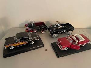 lot 255 image: Collection of 4 Vintage Style Die-Cast Model Cars