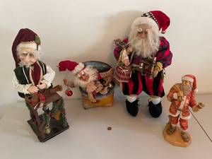 lot 324 image: Set of 4 Mark Roberts Santa Figurines and a Resin Santa