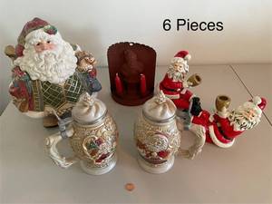 lot 330 image: 6-Piece Christmas Collection Featuring Fitz and Floyd St. Nick Cookie Jar and 1994 Avon Beer Steins
