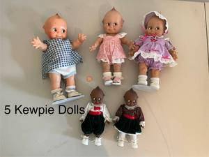 lot 345 image: Collection of 5 Kewpie Dolls with Clothing