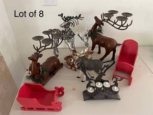 lot 361 image: Set of 8 Holiday Themed Red Sleighs and Reindeer Candle Holders