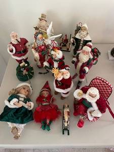 lot 387 image: Assorted Collection of 12 Holiday Figurines Including Santas and Dolls