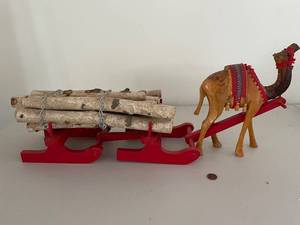 lot 664 image: Handcrafted Wooden Camel Sleigh with Logs