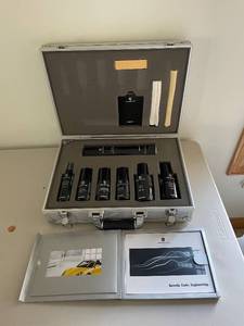 lot 667 image: Porsche Car Care Set with Aluminum Case and Booklets