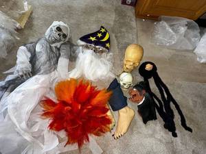 lot 783 image: Collection of Halloween Props Including Skeleton, Wizard, and Masks