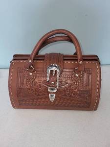 lot 434 image: Handcrafted Leather Satchel with Intricate Detailing by Grants Naturals