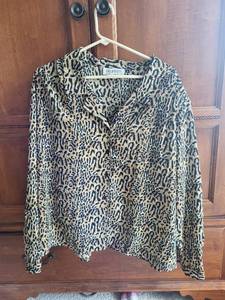 lot 589 image: Collection of Womens Clothing Leopard Print Blouse, Denim Jacket, Denim and Cargo Skirts, Black Cargo Pants