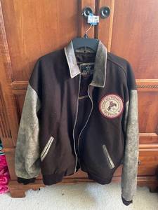 lot 622A image: XL Hollywood Classics Bomber Jacket with Buffalo Bill Historical Center Patch
