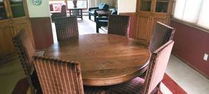 lot 1 image: 1940s 60 Round Oak Table and Chairs Located in Minnetonka. Please see description