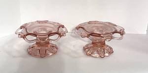 lot 69 image: Pair of Pink Depression Candle Holders