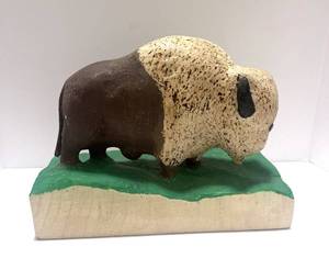lot 111 image: Primitive Buffalo Carving