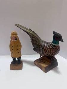 lot 108 image: Two Wood Cravings Fisherman and Pheasant