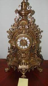 Reproduction 24" Tall Ornate Brass Battery Operated Clock. Very Heavy.
