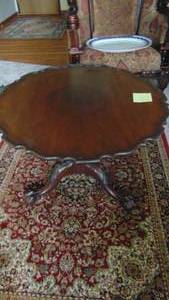 lot 34 image: 21 x 29 Round Vintage Walnut Pie Crust Table with Paw Feet
