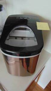 lot 63 image: Hardly Used. Frigidate Ice Machine
