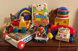 lot 81 image: Toys Galore including Letter Block Wagon, Dinosaur, Book, Pull Toys and More