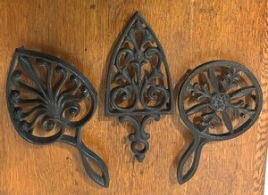lot 145 image: Collection of Vintage Cast Iron Trivets
