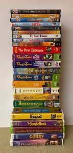 lot 224 image: DVDs and VHS Tapes including Field of Dreams, Veggie Tales, Fly Away Home and More