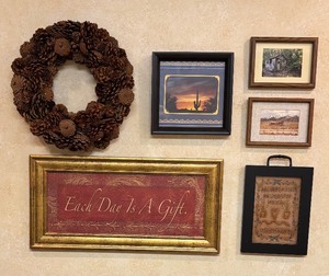 lot 234 image: Wonderful Wall Decor including a Pinecone Wreath, Scenic Prints and Inspirational Prints