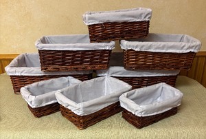 lot 242 image: Nine Wicker Baskets with Lining