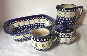 lot 314 image: Boleslawiec Polish Pottery Pitcher, Dish, Creamer Pitcher and Sugar Dish