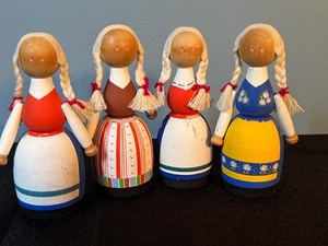 lot 61 image: Set of 4 Handcrafted Swedish Wooden Dolls, 4.25