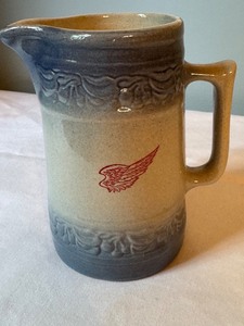 lot 214 image: 5.5 Red Wing Stoneware Pitcher with Wing Logo