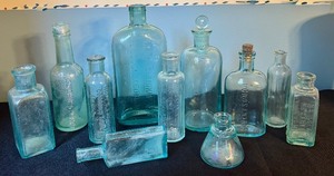 lot 277 image: Collection of 12 Vintage Glass Bottles including Medicine Bottles