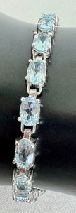 lot 41J image: 7 Topaz and Sterling Silver Bracelet