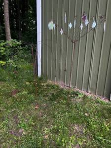 lot 31 image: Set of Two Metal Garden Art Sculptures with Hanging Ornaments