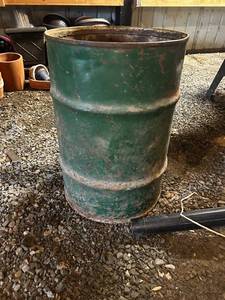 lot 52 image: Large Used Green Metal Barrel