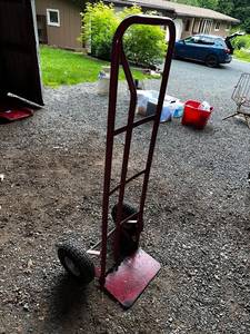 lot 65 image: Used Heavy Duty Red Hand Truck with Pneumatic Wheels