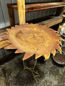lot 83 image: Rustic Metal Sunflower Design Garden Stool