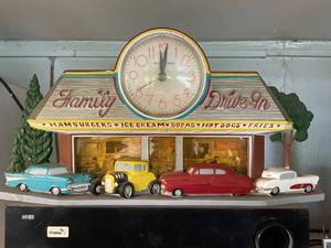 lot 114 image: Vintage Family Drive-In Diner Wall Clock with Classic Car Design