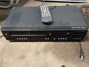lot 117 image: Magnavox 4-Head HQ VHSDVD Player with Remote