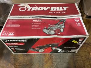 lot 21 image: Troy-Bilt 163cc Gas Powered 21 Front-Wheel Drive Walk-Behind Mower, TB200