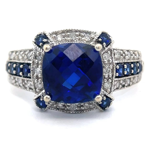 lot 18 image: Halo 0.24 Carat PavNatural Diamond & Blue Sapphire Checkerboard Cut Estate Ring in 14k White Gold VIDEO