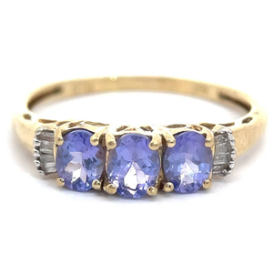 lot 25 image: Natural Diamond & Oval Tanzanite Three-Stone Trellis Ring in Yellow Gold VIDEO