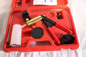 lot 14 image: Automotive Brake Bleeding Kit with Vacuum Pump