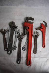 lot 48 image: Set of 9 Mixed Adjustable Wrenches and Pipe Wrenches