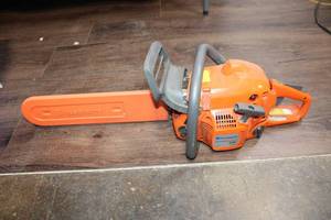 lot A-75 image: Used Husqvarna 450 Chainsaw with Orange Bar