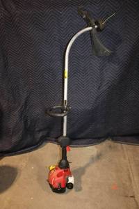lot 102 image: Used Homelite ZR Start Gas String Trimmer