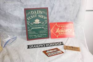 lot 120 image: Collection of Vintage Signage - Fun and Nostalgic Designs