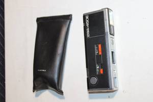 lot 183 image: Vintage Minolta Autopak 450E Pocket Camera with Leather Case