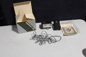 lot 194 image: Vintage Nikkorex Auto 35 Flash Unit with Prinz Charger and Manual