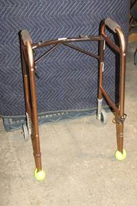 lot 222 image: Adjustable Folding Walker with Tennis Ball Glides